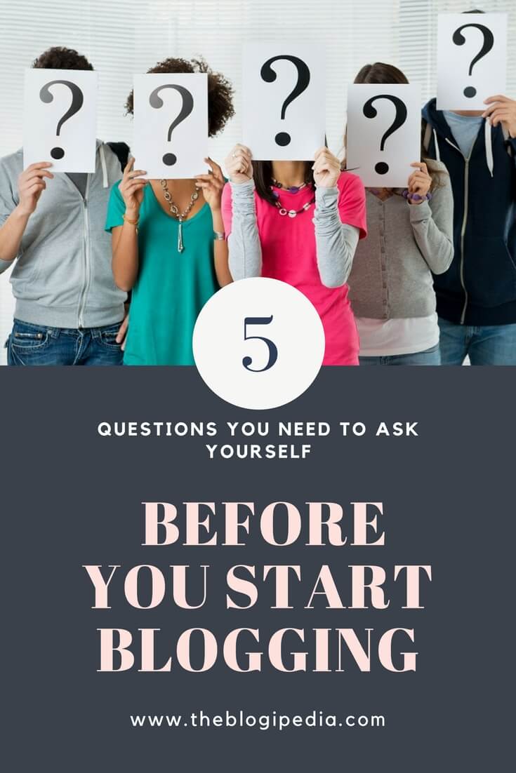 5 People standing with question marks in their hands - Should I Start a Blog illustration